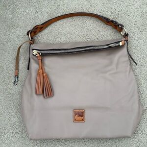 Tan Dooney and Bourke slouchy zippered leather purse